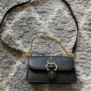Black and gold Coach Crossbody